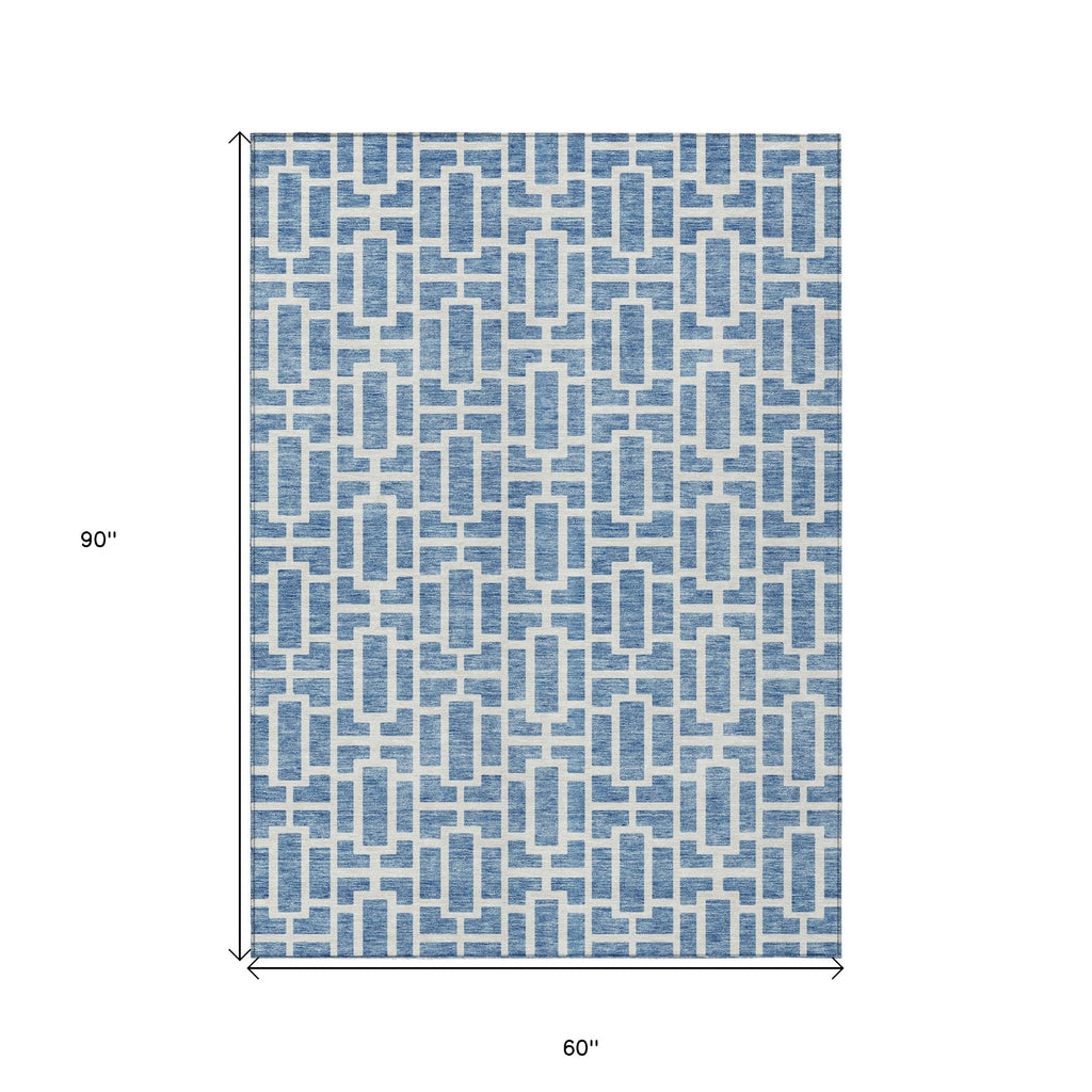 5' X 8' Denim Blue And Ivory Geometric Washable Indoor Outdoor Area Rug